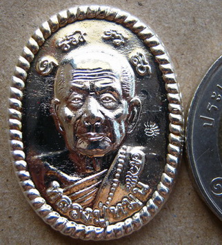 เหรียญดวงเศรษฐี รุ่น2 ทองแดงชุบเงิน หลวงปู่หมุน ปี2556รุ่นหมุนเงินทองดีเฮง วัดป่าหนองหล่ม จ.สระแก้ว