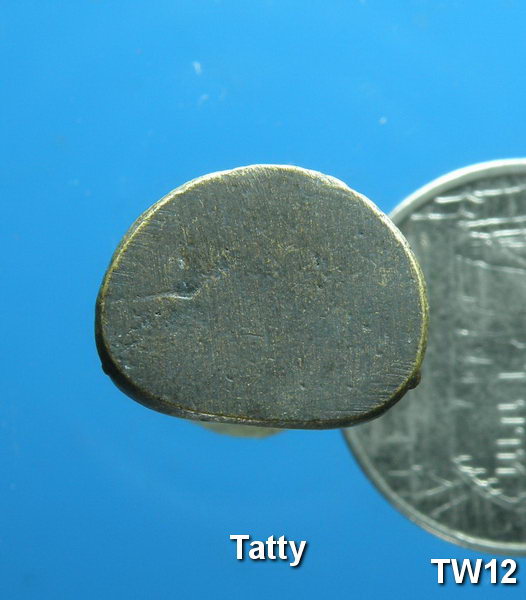 รูปหล่อ ด้านหลังเขียน "จันทิโม"