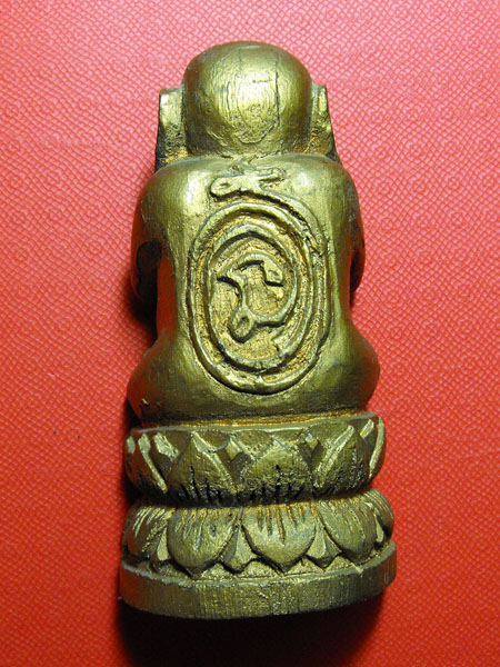 พระปิดตาไม้แกะ เก่ามีอายุ ขนาดบูชา 2.2x4.2 นิ้ว