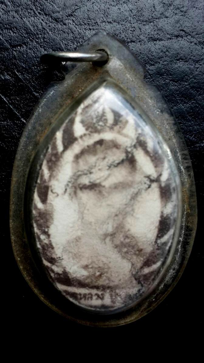 ภาพถ่ายหลังตะกรุดสามกษัตริย์เก่าไม่ทราบเกจิครับ