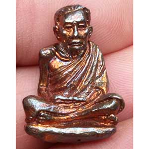 พระรูปหล่อก้นอุดผง  ( ตอกโค็ต )