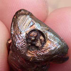 พระรูปหล่อก้นอุดผง  ( ตอกโค็ต )