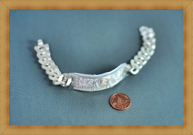 เลสข้อมือเนื้อเงิน "รุ่นเจริญพร" ปี 2554 หนัก 4 บาท ใหม่ป้ายแดง หมายเลข 72 หลวงพ่อรวย วัดตะโก 