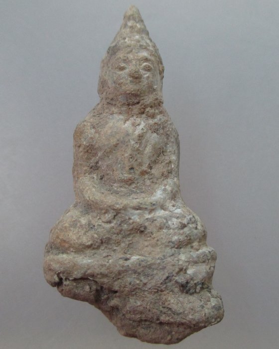 พระพุทธแก้บนเนื้อชินตะกั่วสนิมแดง บรรจุกรุ