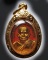 หลวงพ่อทวดเม็ดแตงเคลือบลงยาสีแดง2522 เลี่ยมกรอบทองพร้อมใช้ สวยมาก