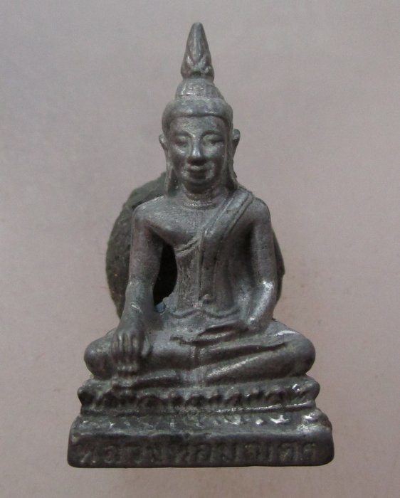 20 บาท รูปหล่อพระพุทธ เนื้อตะกั่ว ไม่ทราบที่ครับ