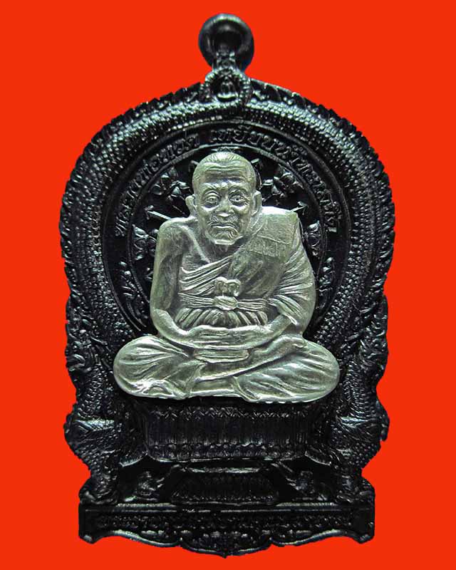 เหรียญนั่งพานหลวงปู่ทวด เนื้อนวะหน้ากากเงิน เจริญปลอดภัย 7 รอบ ตอกสองโคีต หมายเลข 1654