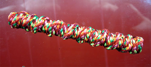 ตะกรุดเทพรัญจวนเนื้อทองแดงถักคุมเต็มดอกยาว 3 นิ้ว หลวงปู่หมุน ฐิตสีโล ยุคต้น