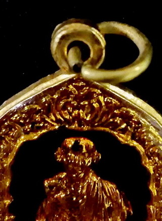 เหรียญหลวงพ่อเกษมรูปเหมือนลงยา 700 ปี ลายสือไทย ปี2526