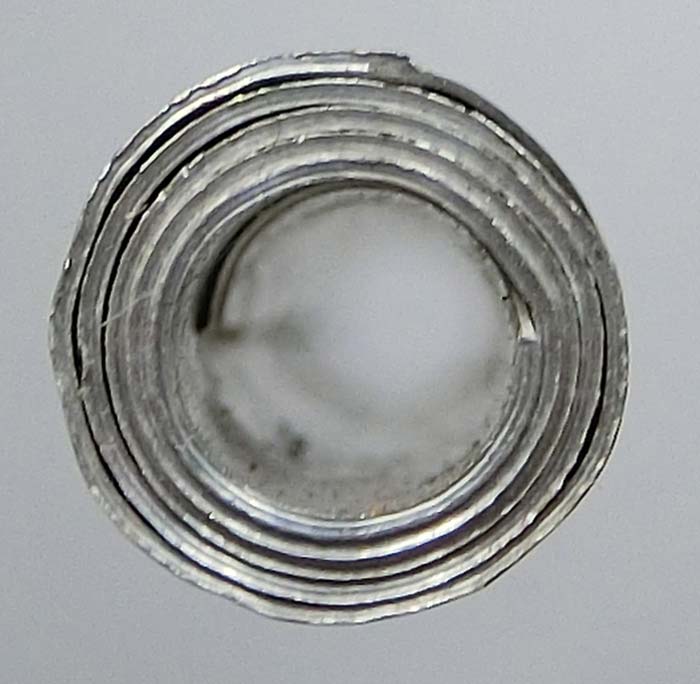 ตะกรุดจารมือยันต์มหาอุดเต็มสูตร เนื้ออลูมิเนียม ปี 2549 โค๊ด วชนกระโดด หลวงพ่อตัด วัดชายนา