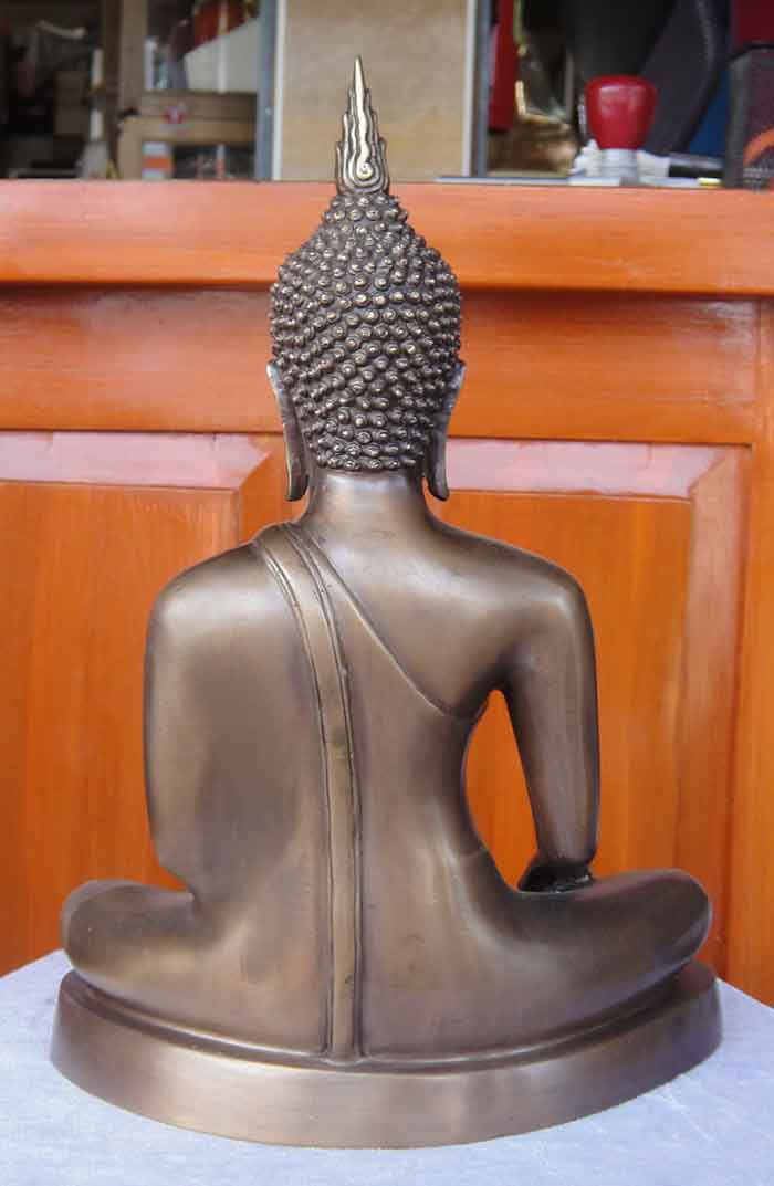 พระบูชาแบบสุโขทัย ปางมารวิชัย 9 นิ้ว ขนาดสูง 12.5 นิ้ว ฐาน 9 นิ้ว เนื้อทองเหลืองรมมันปู ใต้ฐานอุดยัน