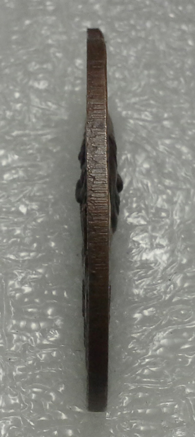 เหรียญท้าวเวสสุวรรณ บล็อกเดียวกันกับบล็อกนิยมสุดแต่เหรียญนี้ไม่มีแตกนะครับ