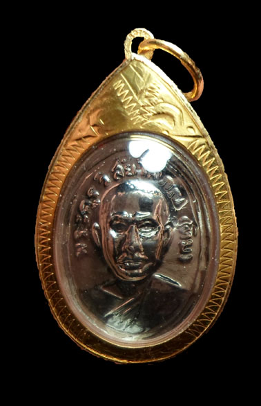 เหรียญเม็ดแตงหลวงปู่ทวดหลังหลวงปู่ทิม พร้อมเลี่ยมทอง