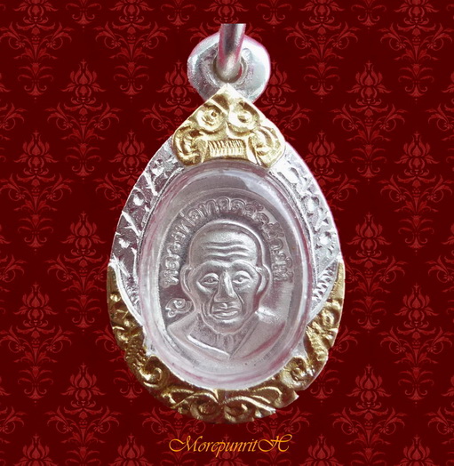 เหรียญเม็ดแตงหลวงพ่อทวด วัดช้างให้ เนื้อเงิน(ตอกโค๊ด) รุ่นบูรณะพระบรมธาตุเจดีย์ พ.ศ.๒๕๕๑