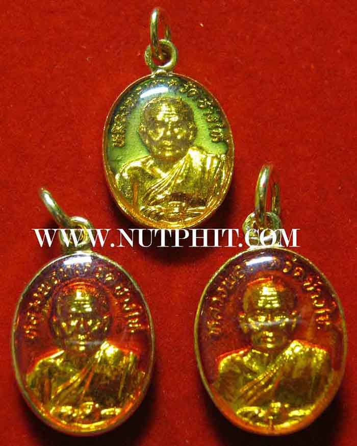 เม็ดแตงอัลปาก้าลงยาเคลือบพลาสติกปี ๒๒ ลป.ทวด วัดช้างให้ 3 องค์มีบัตรรับรองพระแท้ทุกองค์*18