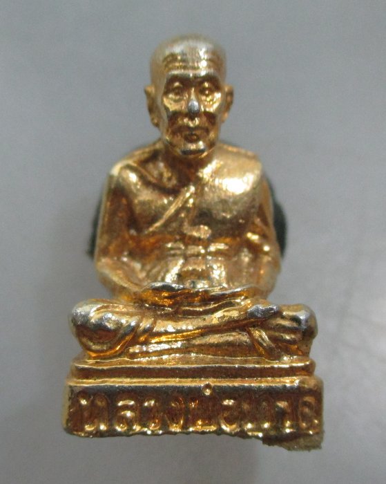 20 บาท รูปหล่อหลวงปู่ทวด วัดช้างให้ ไม่ทราบรุ่นครับ