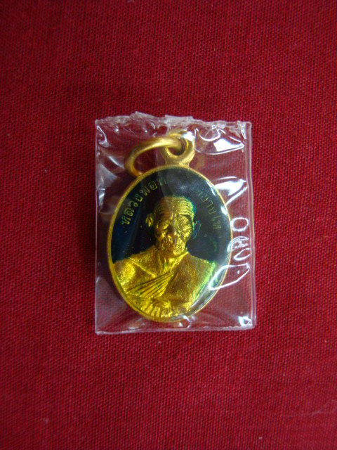 เหรียญแม็ดแตง หลวงปู่ทวด วัดช้างให้ เนื้อทองแดงลงยา ปี๕๕