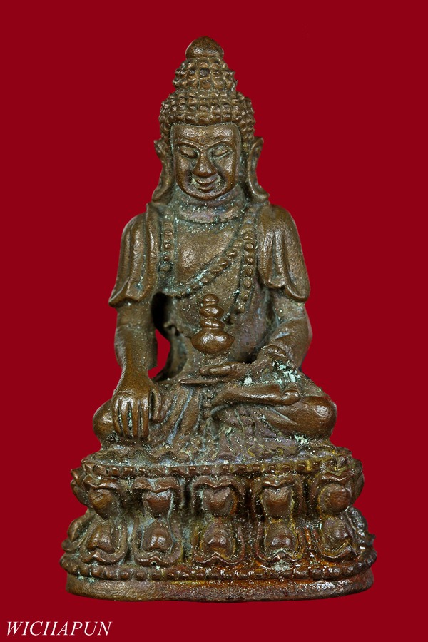 พระกริ่งอรหัง แช่น้ำมนต์  หลวงพ่อเกษม เขมโก  รุ่นพุทธคุณ ปี 38