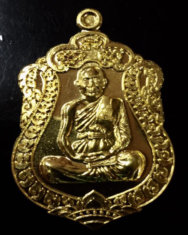 เหรียญเสมาทองคำ รุ่น ฉลองอายุวัฒนะมงคล 7 รอบ หลวงพ่อจรัญ วัดอัมพวัน ปี2554 เลข 165 กล่องเดิม