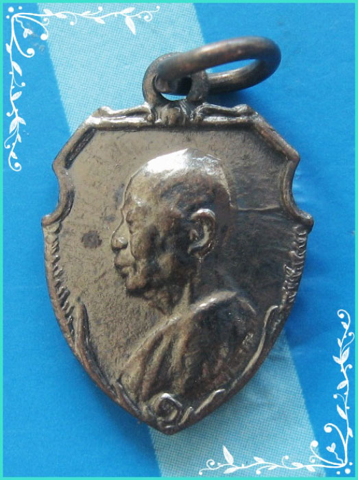 ...ลพ.เงิน วัดดอนยายหอม นฐ. เหรียญหน้าวัว พิมพ์ครึ่งองค์ เนื้อทองแดง หลังยันต์ พิมพ์ย้อนยุค...