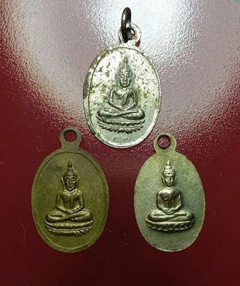 เหรียญพระพุธทหลังนางกวัก ไม่ทราบที่ 