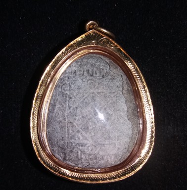 พระปิดตากนกข้างตะกรุดคู่ หลวงปู่โต๊ะ ปี 2522