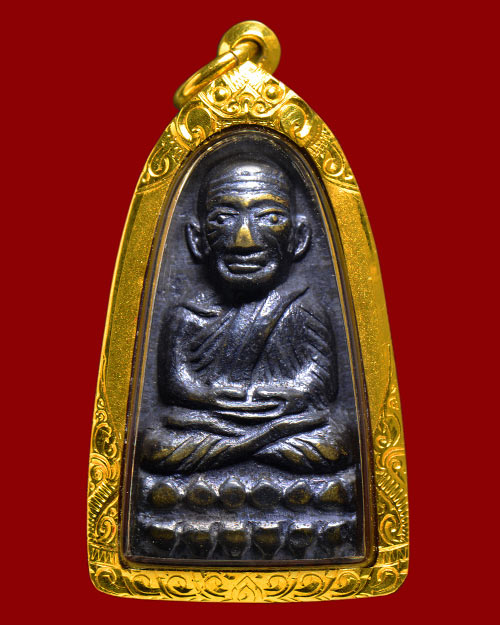 หลังหนังสือเล็ก ว.ตัน หลวงปู่ทวด วัดช้างให้ จ.ปัตตานี+เลี่ยมทอง+บัตรรับรอง