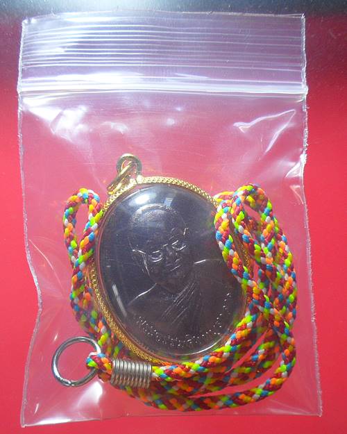 เหรียญหลวงพ่อจรัญหลังพระพุทธแก้วสารพัดนึก(หลวงพ่อดำ) วัดอัมพวัน สิงห์บุรีองค์ที่2