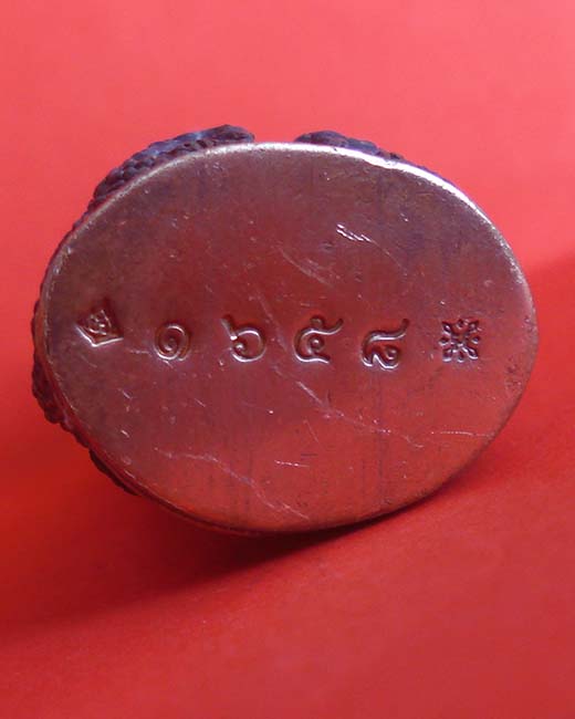 พระกริ่งศรีสุทโธ หลวงปู่บัว วัดศรีบูรพาราม จ.ตราด เนื้อสัมฤทธิ์ ก้นทองแดง หมายเลข ๑๖๕๘ พร้อมกล่อง