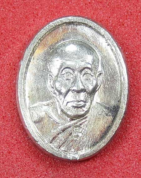 เหรียญเม็ดแตงเนื้อเงินหลวงปู่ืคำบุ วัดกุดชมภู อุบลราชธานี