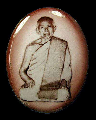 ล๊อกเกตหลวงปู่ทิม พิพิธภัณฑ์บุญญาภิรัติ ตะกรุดยาว เงิน  หมายเลข ๕๗