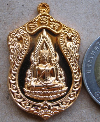 เหรียญเสมา พระพุทธชินราช รุ่นจอมราชันย์ เนื้อทองทิพย์ ปี2555 หมายเลข9471พร้อมกล่องเดิม 