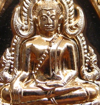 เหรียญเสมา พระพุทธชินราช รุ่นจอมราชันย์ เนื้อทองทิพย์ ปี2555 หมายเลข9471พร้อมกล่องเดิม 