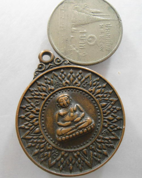 “ เหรียญโภคทรัพย์ พระสังกัจจายน์ รุ่นแรก หลวงพ่อแพ วัดพิกุลทอง จ.สิงห์บุรี ปี 2518 ตอกโค๊ตครับ ”