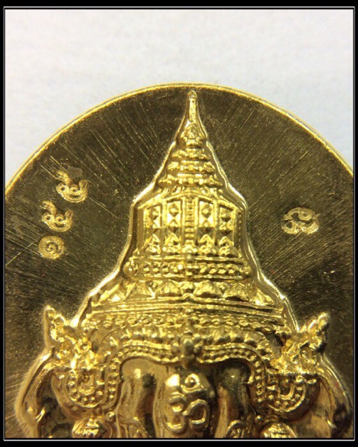 เหรียญเศียรพระพิฆเนศ หลังเรียบ เนื้อทองเหลือง มีโค๊ดกำกับ No.155