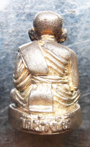 รูปหล่อหลวงปู่ทวดเนื้อเงินอุดกริ่ง ปี32ตอกโค๊ต ท อาจารย์นองปลุกเสกสวยๆครับ