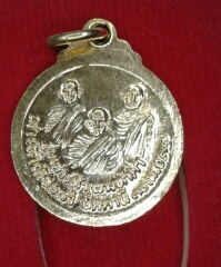 เหรียญกระดุม ใหญ่   ปี37 วัดช้างให้