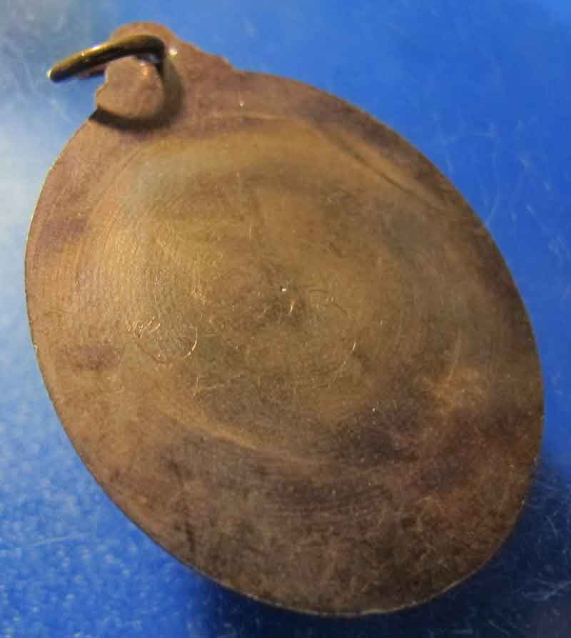 เหรียญอาจารย์ทอง ตลาดพลู พ.ศ. 2554 เนื้อทองแดงนอก หลังเรียบ