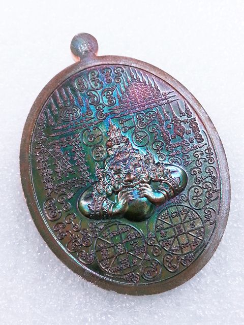 เหรียญพญาครุฑ มหายันต์ เรียกทรัพย์รุ่นแรกหลวงปู่อุดมทรัพย์ (อาจารย์จ่อย) เนื้อทองแดงมันปู  No.97