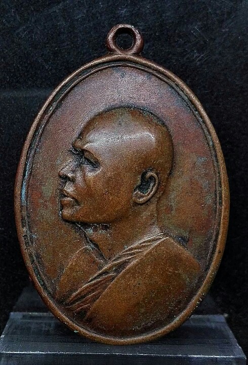 เหรียญ หลวงพ่อแพ วัดพิกุลทอง รุ่นฉลองไตรมาส ปี 2513 หรือที่รู้จักกันโดยทั่วไปในนาม เหรียญ M-16