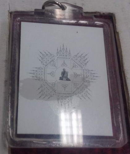 รูปถ่ายหลังยันต์ย้อนยุคหลวงพ่่อกวย วัดโฆสิตาราม เลี่ยมเดิมครับ ปี52