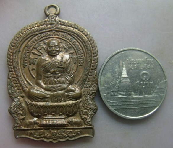**วัดใจ**เหรียญนั่งพาน รุ่นเจริญพร ร่ำรวยเงินทอง หลวงปู่ทิม วัดพระขาว จ.อยุธยา ปี ๒๕๓๙**