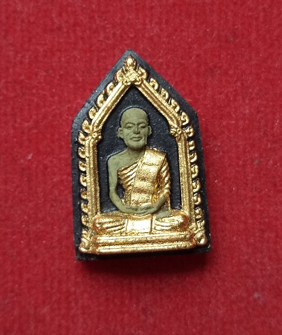 พระผงพิมพ์รูปเหมือนเจ้าคุณนรฯ เนื้อเขียว ปี 2515