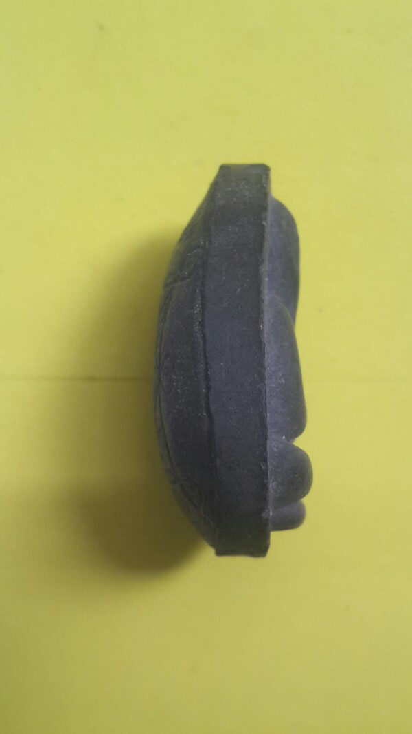 พระปิดตาหลังยันต์ตรีนิสิงเห หลวงปู่โต๊ะ 