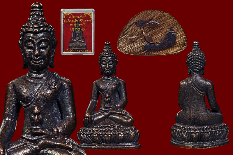 พระกริ่งพระเจ้าตากสินเนื้อโลหะรมดำ หลวงปู่บัว ถามโก วัดศรีบุรพาราม พศ.2554