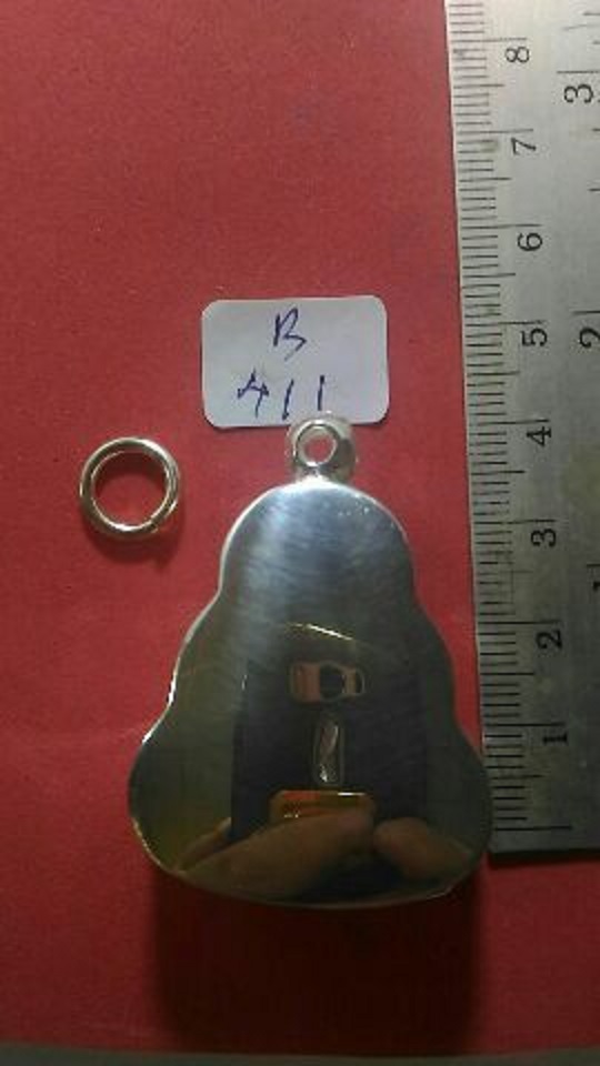 ตลับเงิน ขัดเงา  ปิดหลัง  ชุบทองคำขาว  ใส่ปิดตา  สายวัดสะพานสูง  เคาะเดียว 