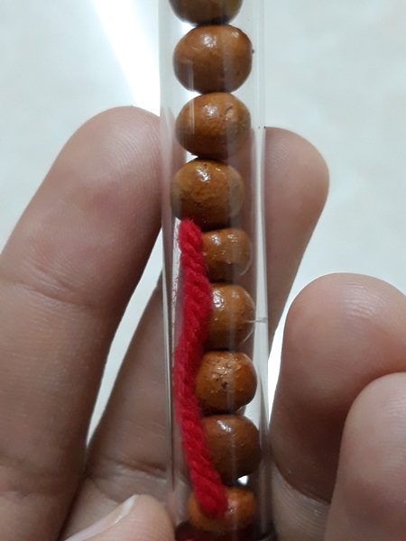 เม็ดประคำเสาร์ 5 ปี 43 สีน้ำตาล รวม 9 เม็ด หลวงปู่หมุน