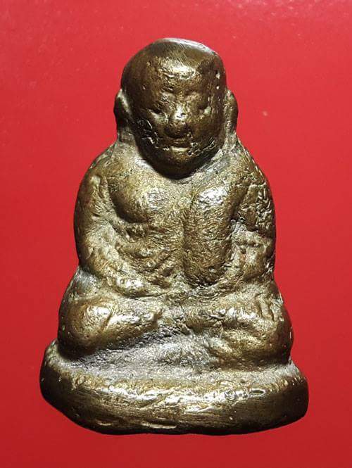 รูปหล่อหลวงพ่อเงิน วัดบางคลาน เนื้อทองเหลืองผสม ผิวองค์พระเป็นริ้วลายมุ้งทั่วองค์พระ 