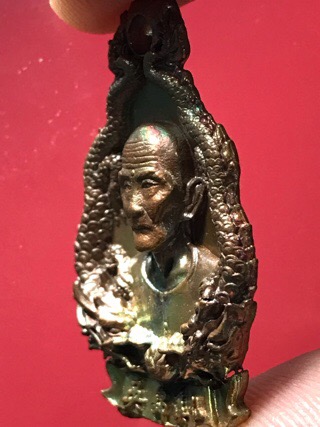 เหรียญหล่อมังกรคู่ อาจารย์โง้วกิมโคย(เซียนแปะโรงสี)รุ่นฟ้าประทานพร เนื้อทองแดงมันปู ผิวรุ้งๆ  no.566