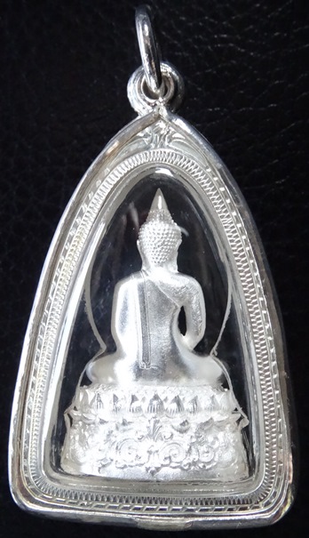 พระกริ่ง 9 ทศวรรษ เนื้อเงิน  No.1180 พร้อมเลื่ยมเงินลงยายกซุ้ม อัดกรอบกันน้ำอย่างดี